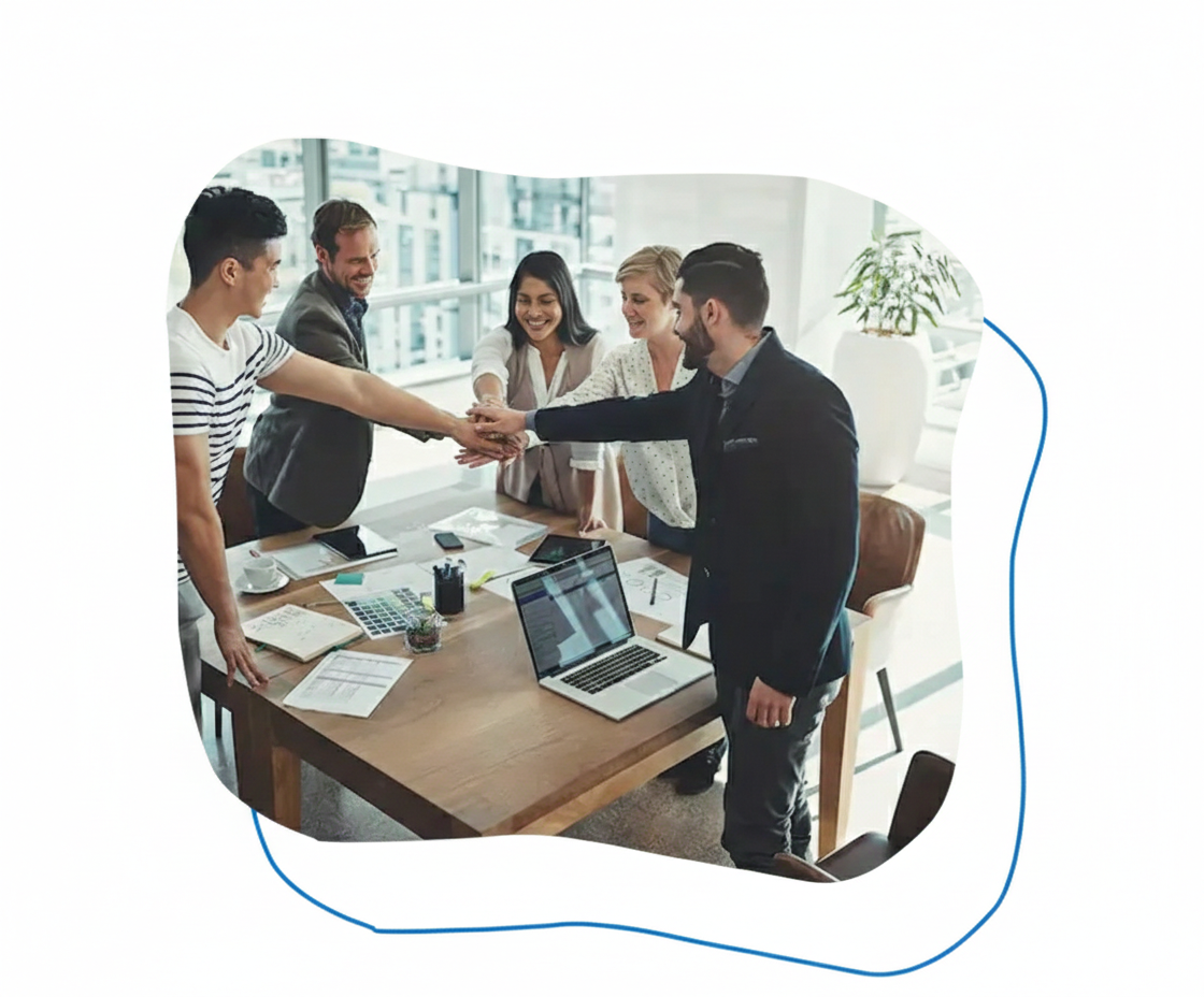 Team high-five in meeting